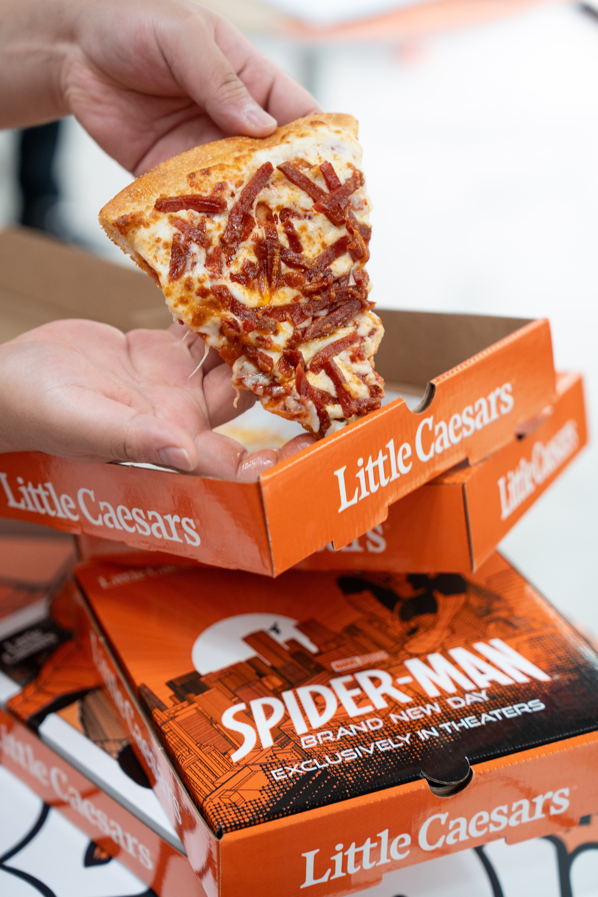 Close-up of the Little Caesars x Spider-Man: Brand New Day container wall signage