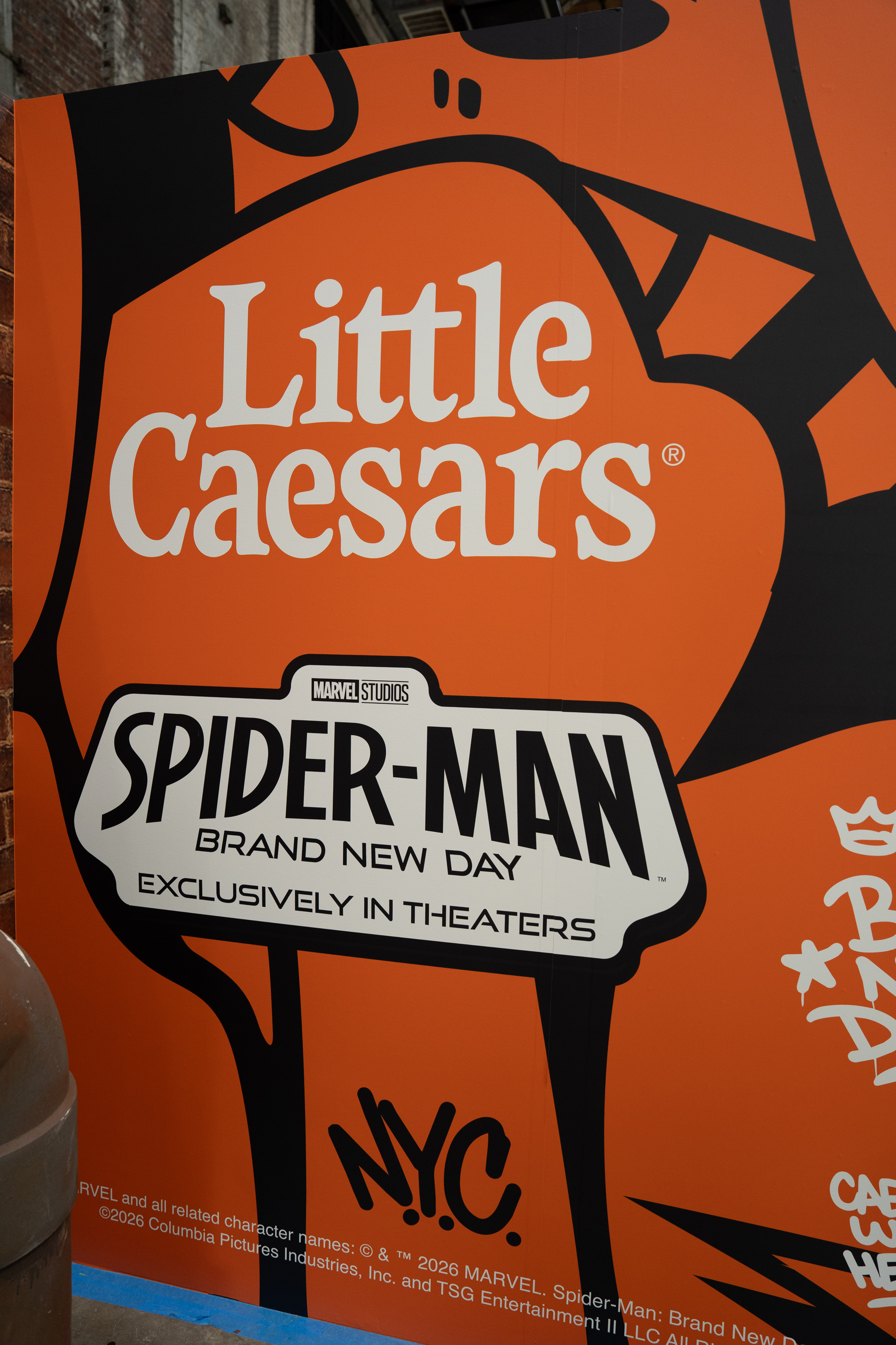 Close-up of the Little Caesars x Spider-Man: Brand New Day container wall signage